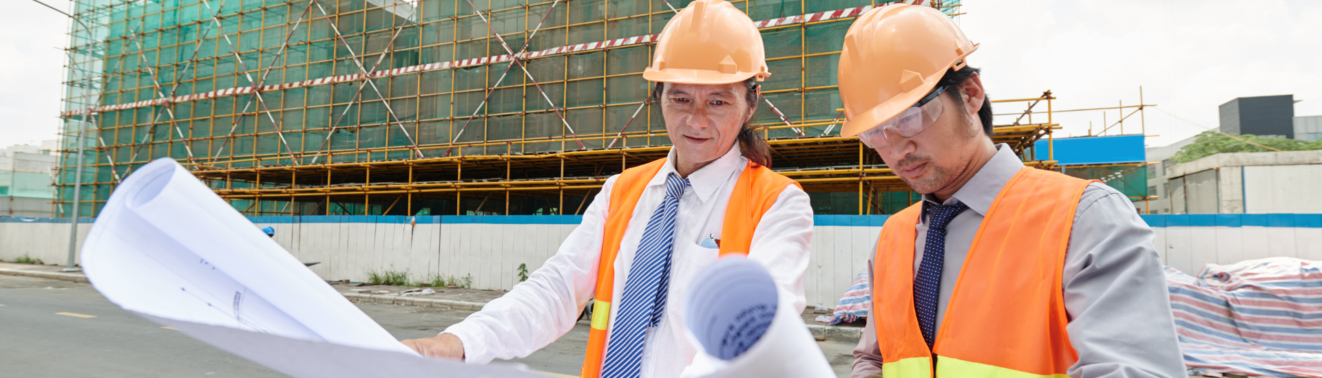 worker with constuction sheet